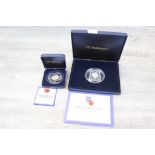 Two cased Westminster Mint Silver proof £5 pounds Poppy coins, 2008 & 2011 with COA's