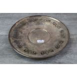 Silver circular salver with pierced border decoration, floral and foliate decoration to scrolled