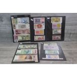 Banknotes - assorted World in five sleeves