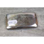 George V silver calling card case of rectangular form, engraved initials to centre, presentation