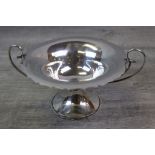 Edwardian silver twin handled pedestal bowl, the bowl and foot with pie crust border, with