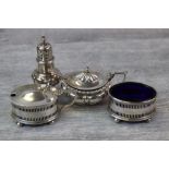 George V silver mustard pot and silver open oval salt cellar and matching mustard pot, raised on