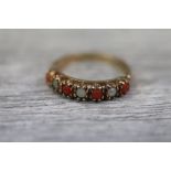 Coral and cultured seed pearl 9ct yellow gold ring, claw settings (nacre to pearls damaged)