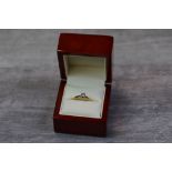 Diamond solitaire 18ct yellow gold ring, the round brilliant cut diamond weighing approximately 0.25
