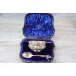 Cased Edwardian silver quaich and spoon, the quaich with pierced foliate scroll design handles and