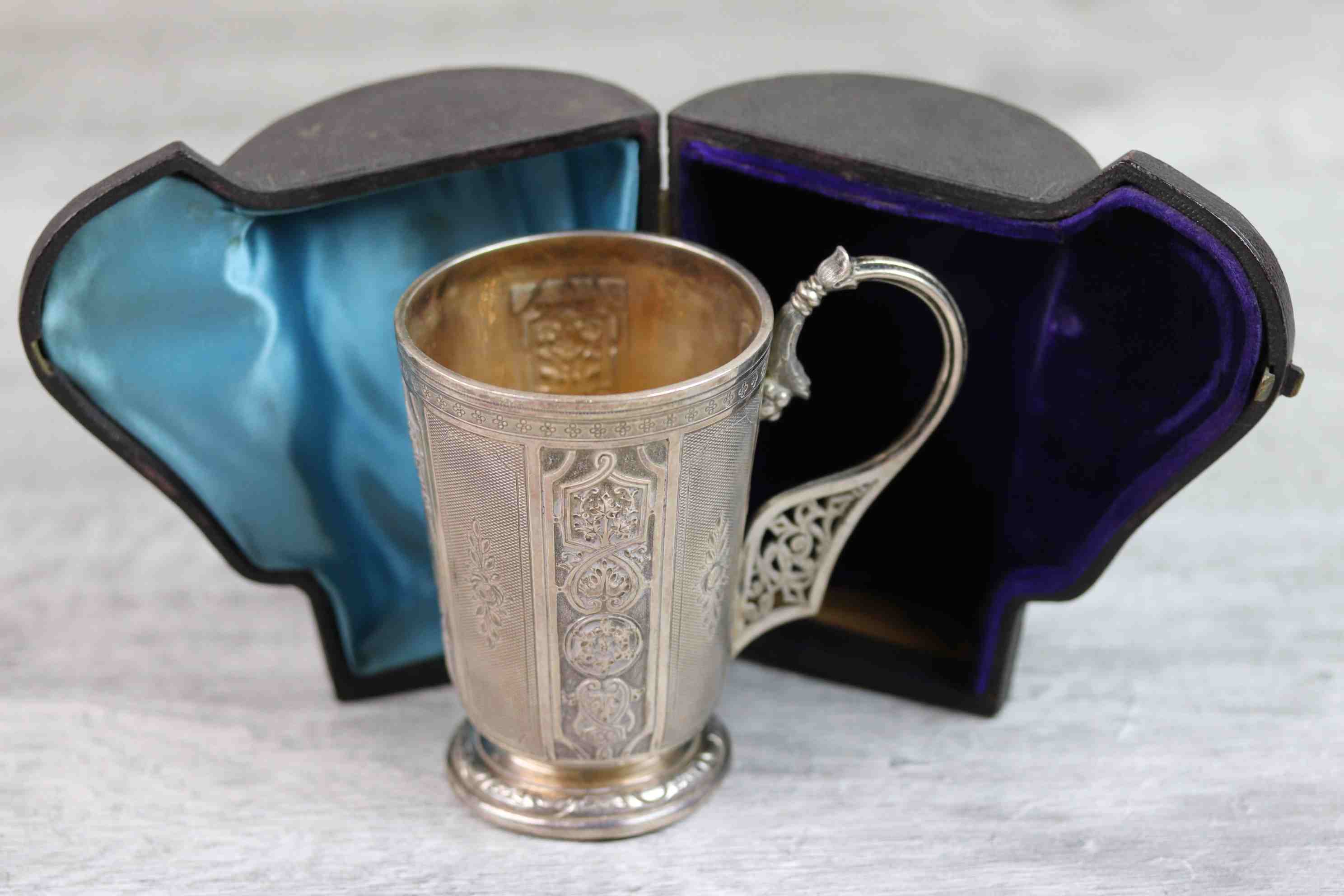 Victorian silver footed mug with sectional repousse scroll and stylised foliate decoration to - Image 2 of 13