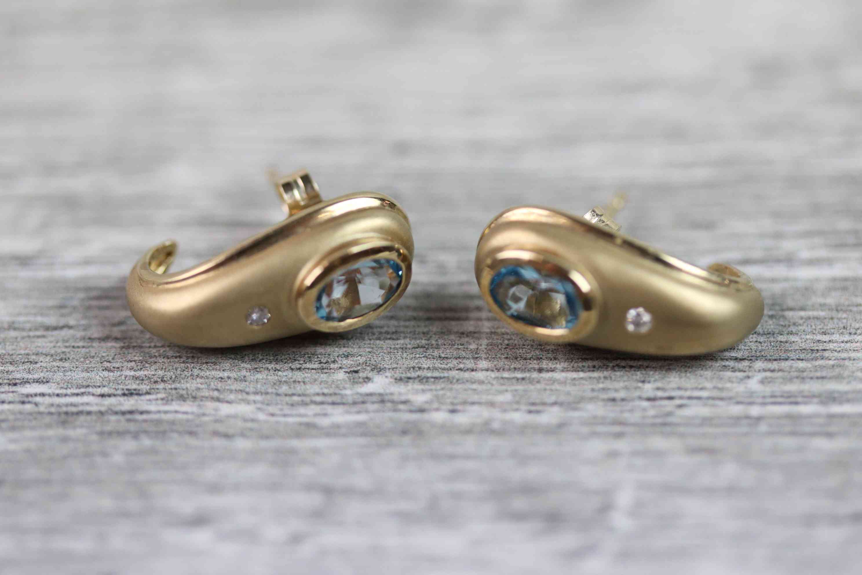 Pair of blue topaz and diamond 9ct yellow gold earrings of tapered teardrop shaped form, the oval - Image 7 of 7