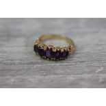 Amethyst five stone 9ct yellow gold ring