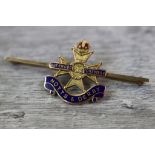 Early 20th century Sherwood Foresters Notts & Derby enamelled 9ct gold sweetheart bar brooch,
