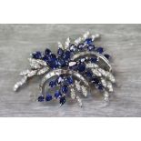 Sapphire and diamond 14ct white gold floral spray brooch, comprising thirty graduated pear-shaped