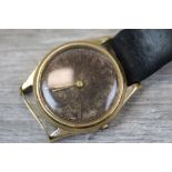Mimo 9ct gold cased watch, black enamel dial, gilt Arabic numerals and poker hands, missing winder