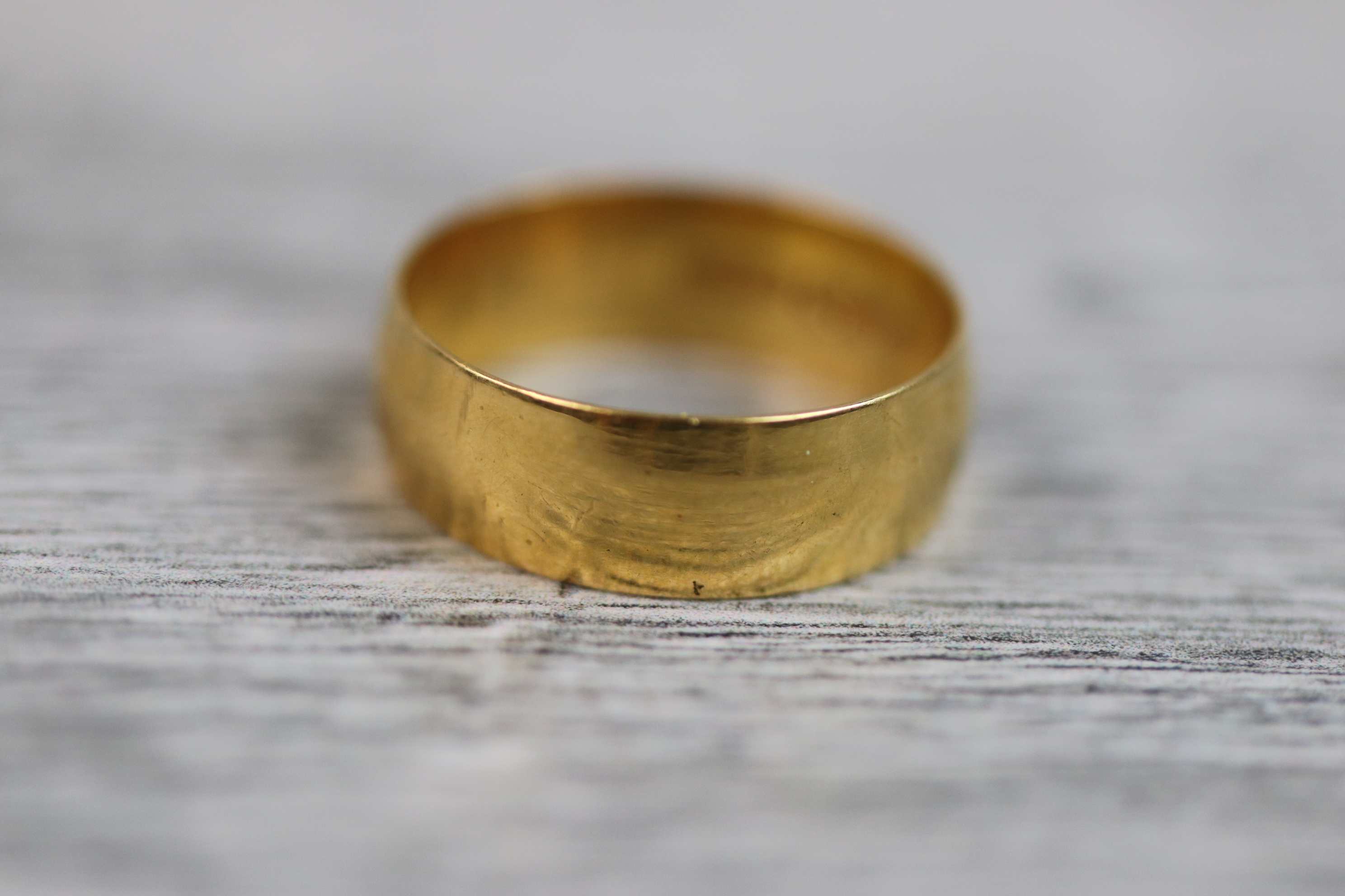 22ct yellow gold wedding band, width approximately 6mm, ring size L½