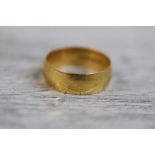 22ct yellow gold wedding band, width approximately 6mm, ring size L½