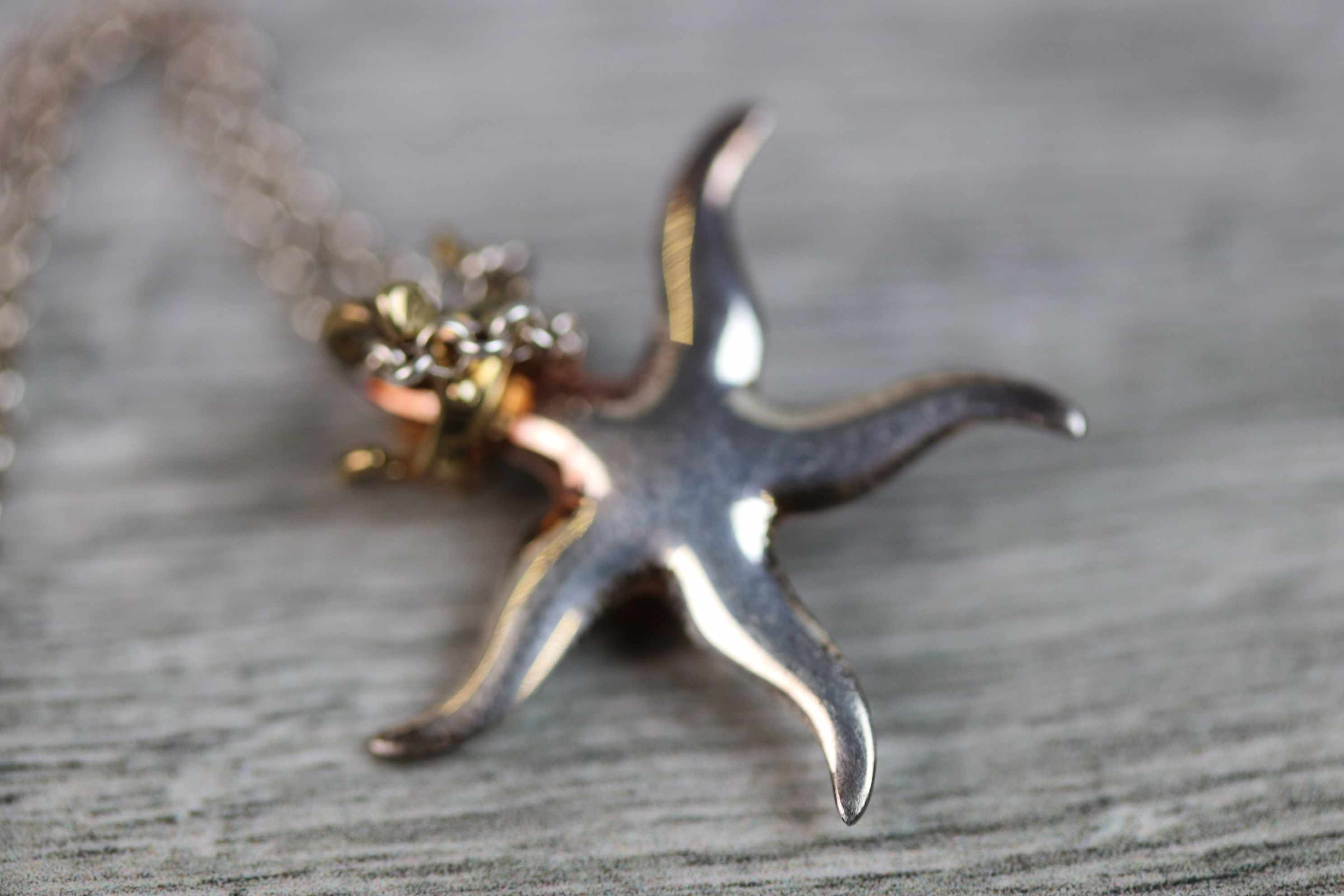 Asprey silver pendant necklace modelled as a gilt crowned starfish, dimensions approximately 25mm - Image 5 of 5