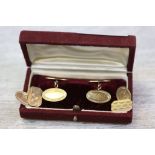 Pair of George V 9ct yellow gold chain link cufflinks, each oval panel with engraved zigzag