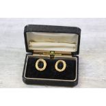 Pair of 9ct yellow gold 1980s earrings, two row rope twist oval open centre design, clip on backs,