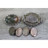 Victorian silver oval sweetheart brooch, the central raised panel with forget-me-not flowers and
