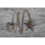 Asprey silver pendant necklace modelled as a gilt crowned starfish, dimensions approximately 25mm