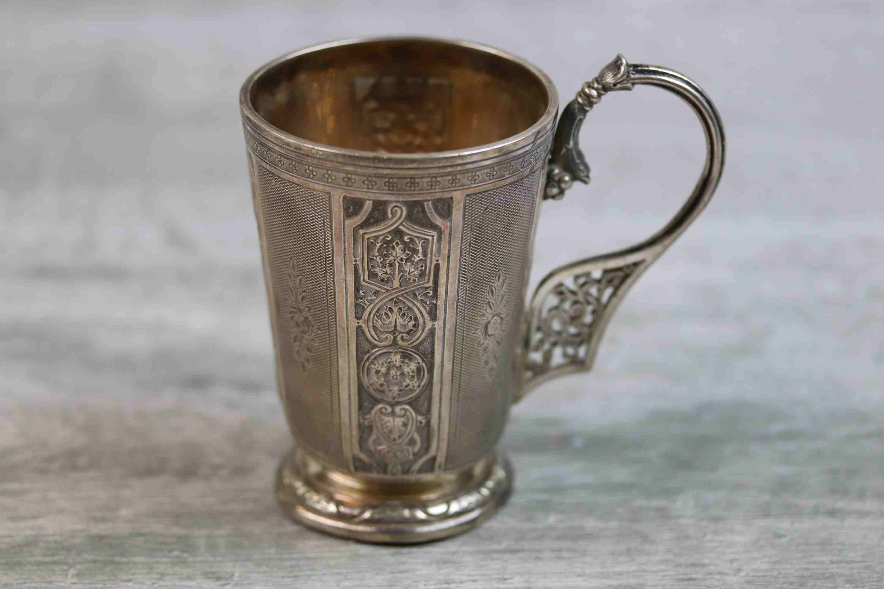 Victorian silver footed mug with sectional repousse scroll and stylised foliate decoration to - Image 3 of 13