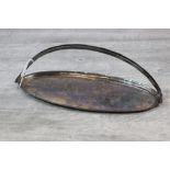 Oriental silver oval dish with hammered looped double handle, character mark to base, length