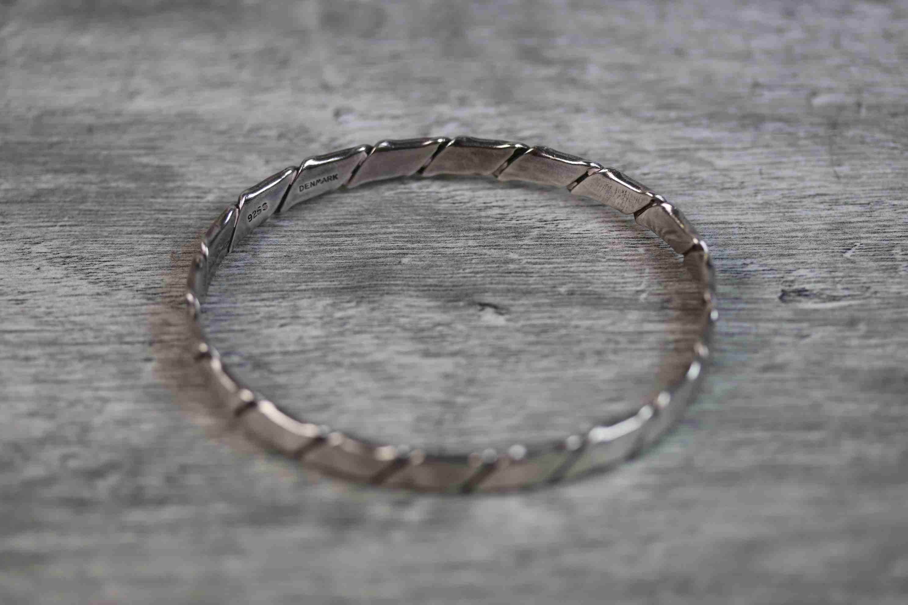 Hans Hansen Danish silver bangle, of scrolled ribbon design, width approximately 6mm, signed Hans - Image 6 of 6