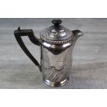 Late Victorian silver hot water pot, gadroon and foliate scroll decoration to lower half, horse head