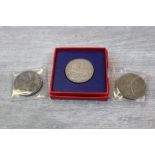 Three 1935 UK Silver Rocking Horse Crown coins to include a boxed example