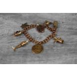 9ct rose gold double curb link bracelet with padlock clasp comprising a George V George and the