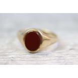 Carnelian 9ct yellow gold signet ring, the oval carnelian measuring approximately 9.5mm x 7.5mm,