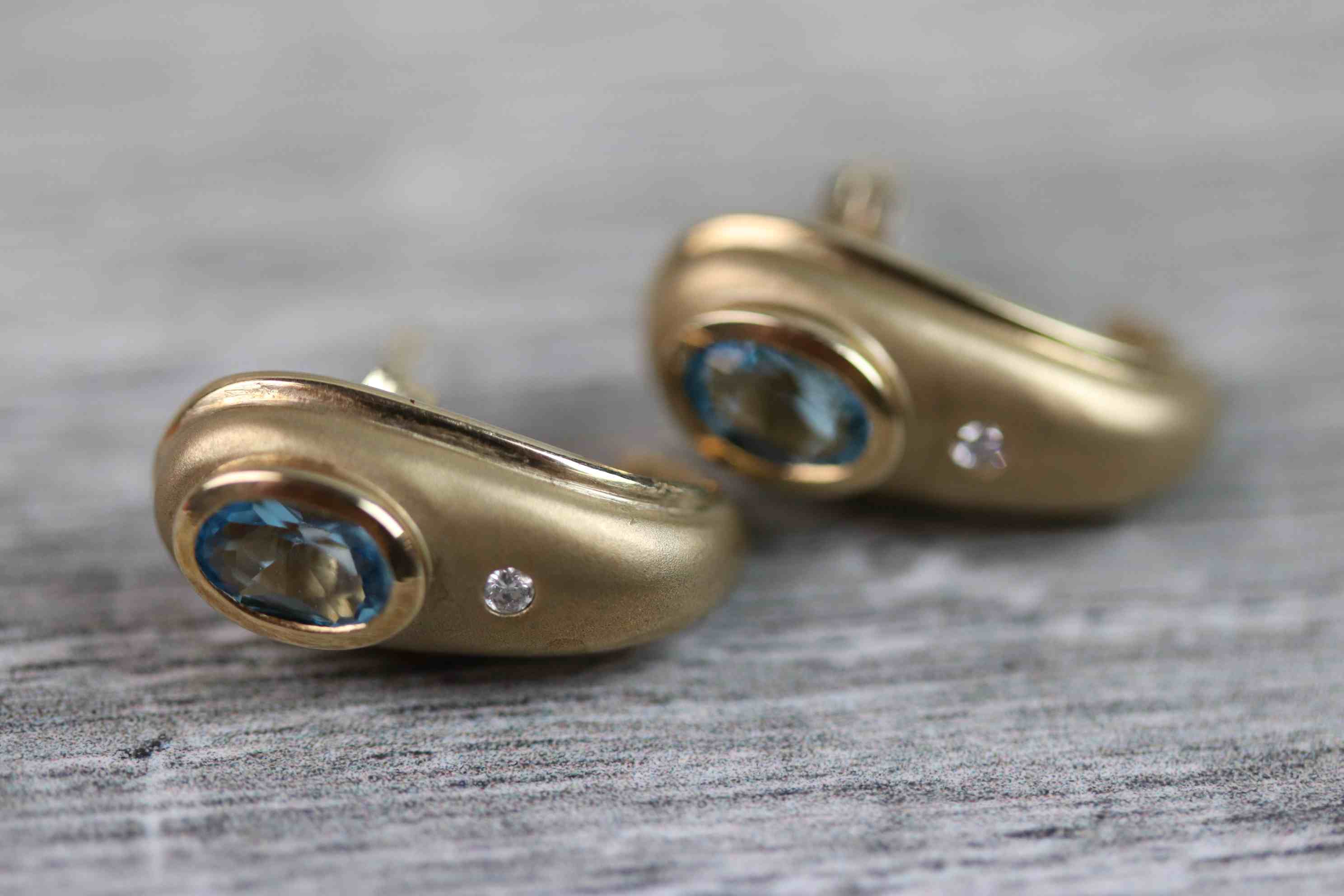 Pair of blue topaz and diamond 9ct yellow gold earrings of tapered teardrop shaped form, the oval - Image 2 of 7