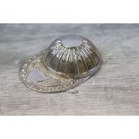 Novelty silver caddy spoon modelled as a jockey's cap, repousse garland style floral and star