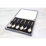 Six silver coffee spoons with horse head finials, tapered stems, makers S J Rose & Son, Birmingham