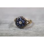 19th century diamond and sapphire yellow gold and silver set flower head cluster ring
