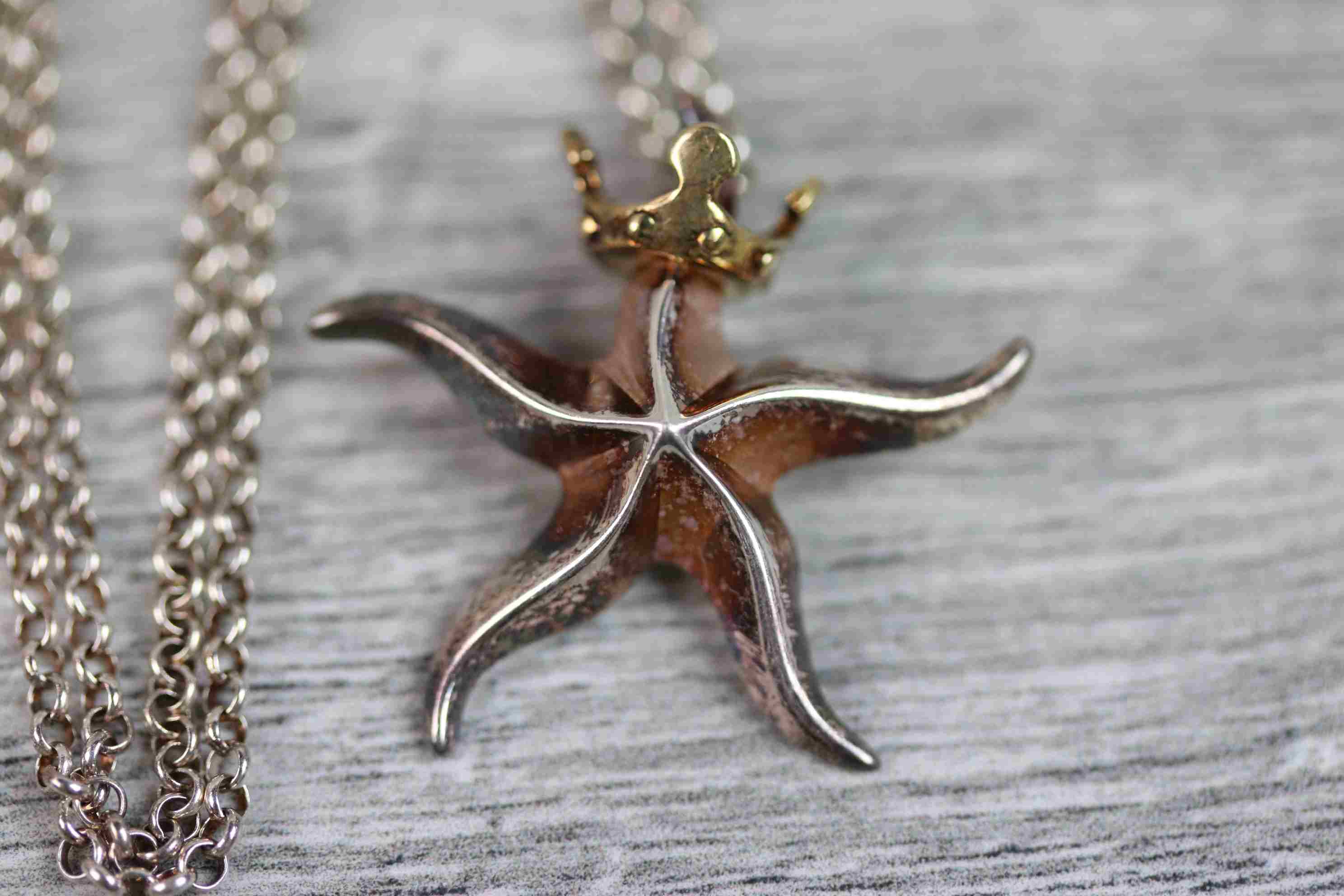 Asprey silver pendant necklace modelled as a gilt crowned starfish, dimensions approximately 25mm - Image 2 of 5