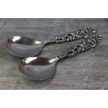 Brodrene Mylius: pair of Norwegian silver caddy spoons, pierced foliate scroll handle, plain bowl,