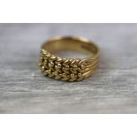 Victorian 18ct yellow gold three row keeper ring, plaited form with intersecting beads, width of