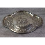 Art Nouveau silver tray of curved form with four repousse cherubs to centre and sinuous scroll