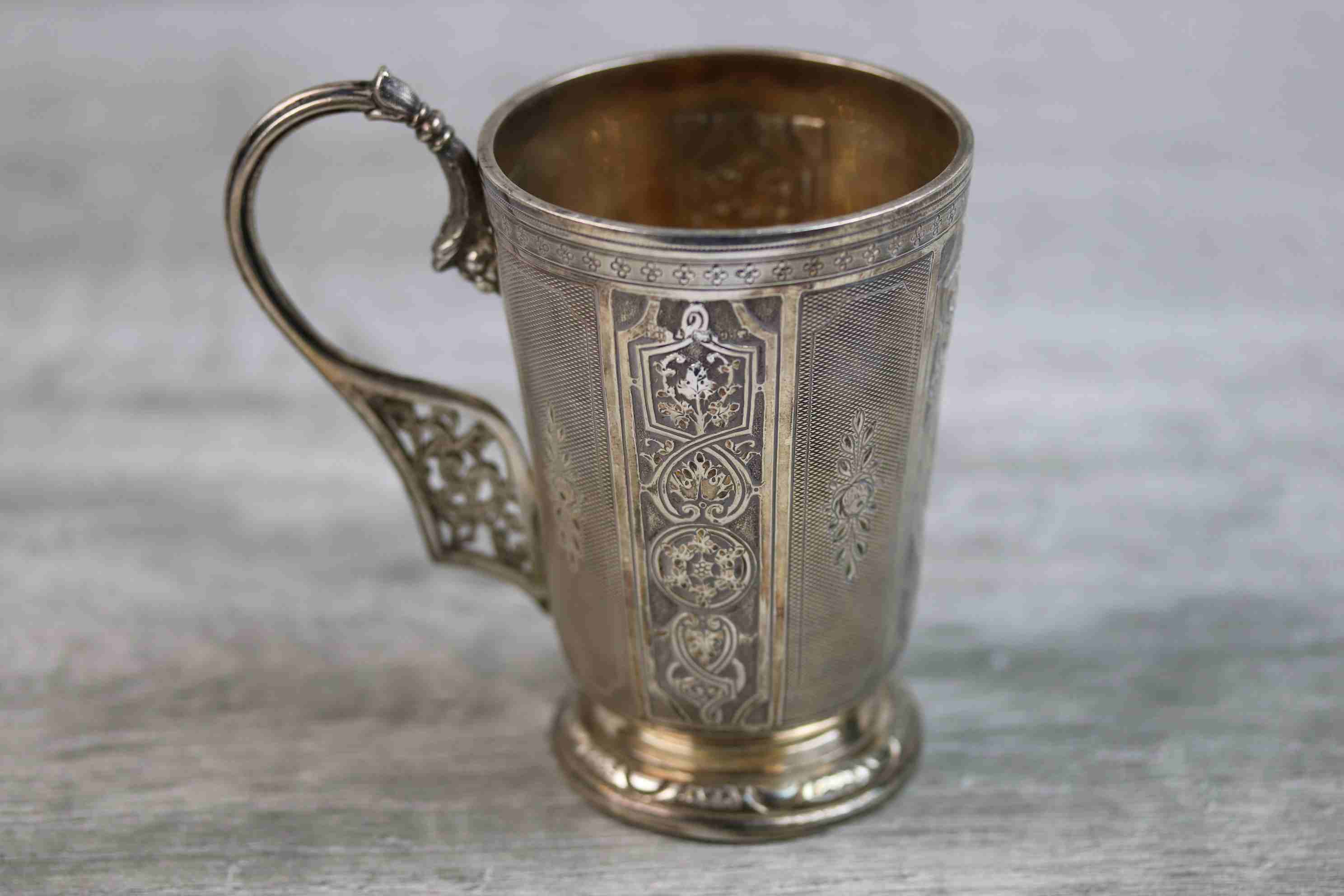 Victorian silver footed mug with sectional repousse scroll and stylised foliate decoration to - Image 5 of 13