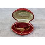 Red leather boxed Ladies 9ct Gold Omega wristwatch cal. 485 circa 1969, with original 9ct Gold