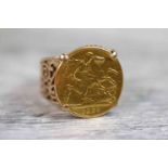 Half sovereign mounted 9ct yellow gold ring, the Edwardian half sovereign dated 1902, four claw