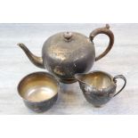 Goldsmiths and Silversmiths silver melon shaped tea pot and milk jug, wooden handle and finial to