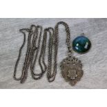 Victorian white metal guard chain together with Edwardian silver fob medallion, the central