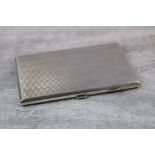 George V silver cigarette case, engine turned zigzag decoration in bands to front and back, gilt