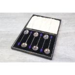 Cased set of six George V silver coffee bean finial coffee spoons, purple bakelite coffee bean