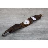 WW1 Trench style 9ct Gold wristwatch with enamel dial & sub - seconds dial at the six position and
