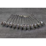 Set of twelve Edwardian silver rat tail pattern coffee spoons, makers Josiah Williams & Co, London