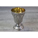 Victorian silver goble, heavily engraved floral decoration within scrolled panels to the bowl,