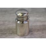 Late Victorian silver scent bottle of plain cylindrical form, complete with liner and stopper,