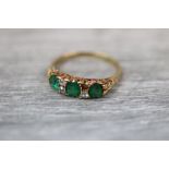 Victorian composite and diamond boat head 18ct yellow gold ring, three cushion cut green composite