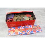 Red tin of mixed UK & World coinage, mostly Cupro Nickel, Copper & Brass